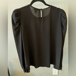 Vince Camuto Blouse in sheer fabric. Black size XS. NWT
